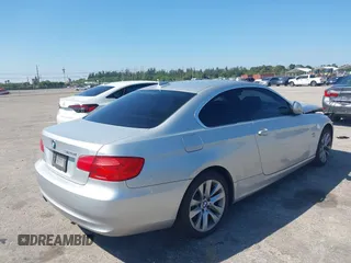 2013 BMW 3 Series 328i xDrive with VIN WBAKF5C50DJ297831, listed as a IAAI auction lot 41894859 with 87,174 mi miles. Bid and sale history available at carsss.com. Image 4.