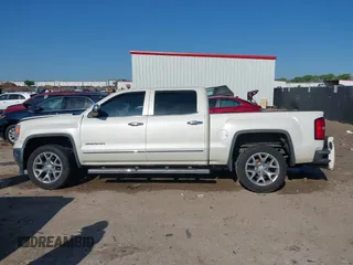 2014 GMC Sierra 1500 SLT with VIN 3GTP1VEC5EG486951, listed as a IAAI auction lot 41939376 with 131,857 mi miles and . Bid and sale history available at DreamBid. Image 14.