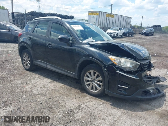 2016 Mazda CX-5 Sport with VIN JM3KE4BY2G0796577, listed as a IAAI auction lot 42230645 with 103,223 mi miles and . Bid and sale history available at DreamBid. Image 1.