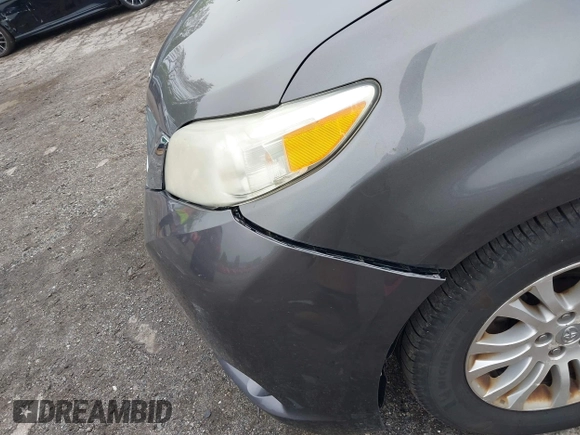 2014 Toyota Sienna XLE with VIN 5TDYK3DC0ES436502, listed as a IAAI auction lot 42180990 with 154,839 mi miles and . Bid and sale history available at DreamBid. Image 21.