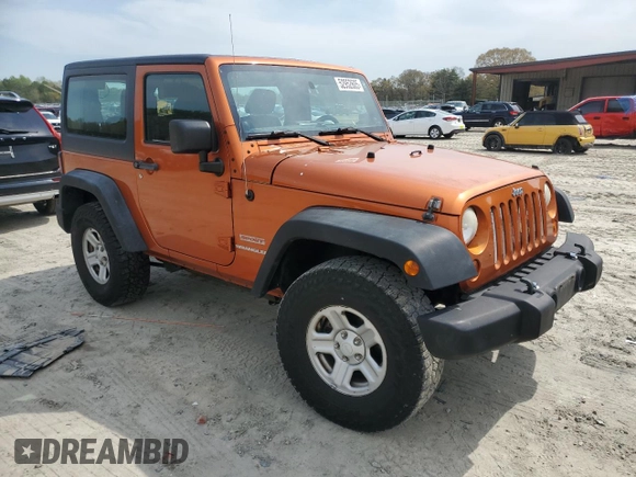 2011 Jeep Wrangler Sport with VIN 1J4AA2D15BL574234, listed as a Copart auction lot 52952605 with 114,642 mi miles and Salvage Title. Bid and sale history available at carsss.com. Image 4.