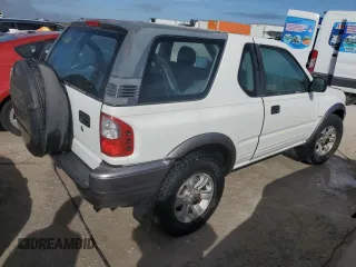 2001 Isuzu Rodeo z VIN 4S2CK57W614340766, wystawiony jako Copart lot #73891524 z przebiegiem 124 446 mil mil oraz Nie do naprawy. Historia ofert i sprzedaży dostępna na DreamBid. Obrazek 3.