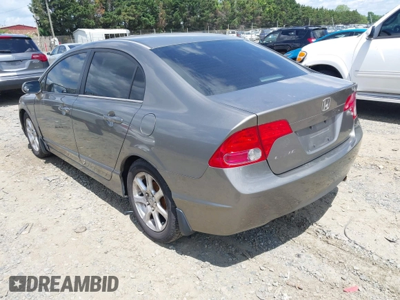 2006 Honda Civic LX with VIN 1HGFA16586L104230, listed as a IAAI auction lot 42215822 with 128,704 mi miles and . Bid and sale history available at DreamBid. Image 3.