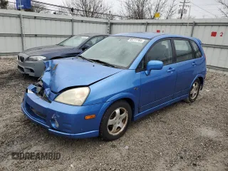 2004 Suzuki Aerio SX z VIN JS2RC61H145254580, wystawiony jako Copart lot #85777764 z przebiegiem 115 762 mil mil oraz Szkoda całkowita • Salvage title. Historia ofert i sprzedaży dostępna na DreamBid. Obrazek 1.