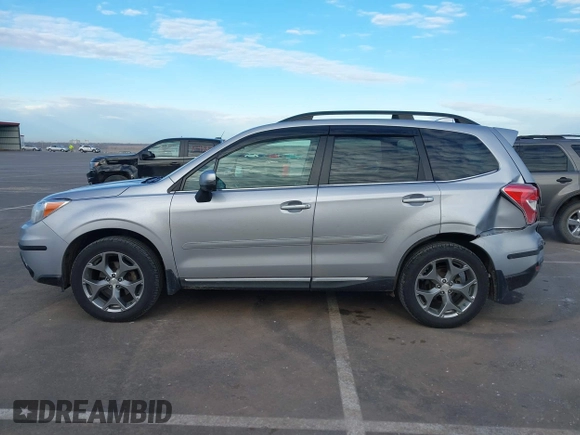 2016 Subaru Forester 2.5i Touring with VIN JF2SJAXC7GH455601, listed as a IAAI auction lot 41876613 with 133,976 mi miles. Bid and sale history available at carsss.com. Image 15.