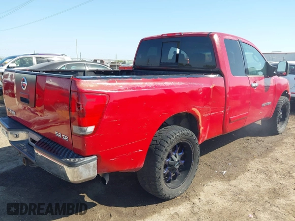 2006 Nissan Titan SE with VIN 1N6BA06A56N566699, listed as a IAAI auction lot 41767841 with 203,499 mi miles and . Bid and sale history available at DreamBid. Image 4.