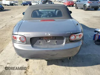 2006 Mazda MX-5 Miata Sport z VIN JM1NC25F260115830, wystawiony jako Copart lot #76844774 z przebiegiem 52 599 mil mil oraz Szkoda całkowita • Salvage title. Historia ofert i sprzedaży dostępna na DreamBid. Obrazek 6.