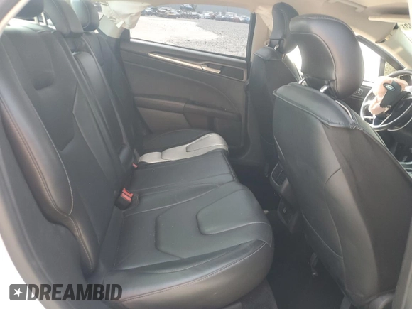 2014 Ford Fusion Titanium с VIN 3FA6P0D93ER205744, выставлен на аукционе Copart как лот 56228345 с пробегом 160 882 миль миль и Списание • Salvage title. История ставок и продаж доступна на DreamBid. Изображение 10.