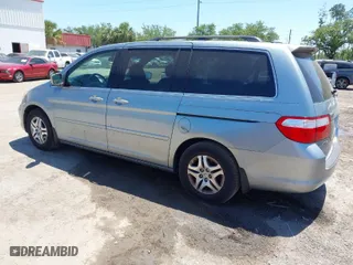 2006 Honda Odyssey EX-L with VIN 5FNRL38776B098021, listed as a IAAI auction lot 42036487 with 176,043 mi miles. Bid and sale history available at carsss.com. Image 3.