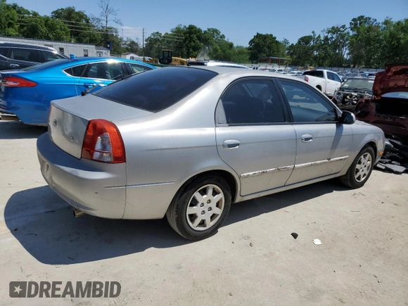 2004 Kia Spectra GS with VIN KNAFB161945141309, listed as a Copart auction lot 52395445 with 99,100 mi miles and Clean Title. Bid and sale history available at DreamBid. Image 3.