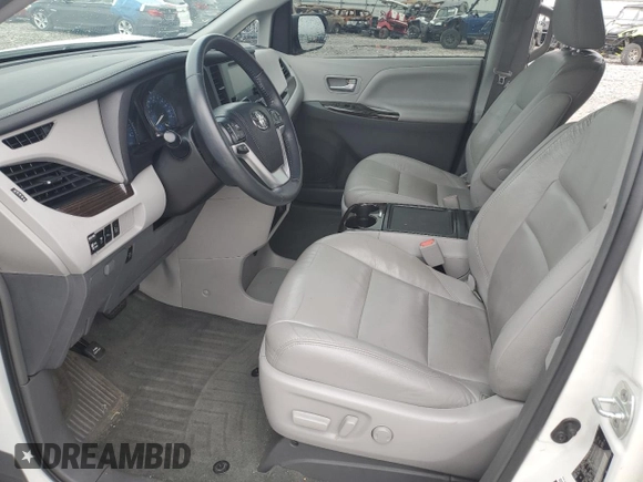 2016 Toyota Sienna XLE с VIN 5TDYK3DC5GS752884, выставлен на аукционе Copart как лот 54621775 с пробегом Не указан миль и Списание • Salvage title. История ставок и продаж доступна на DreamBid. Изображение 7.