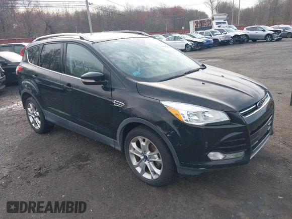 2014 Ford Escape Titanium with VIN 1FMCU9J98EUD73818, listed as a IAAI auction lot 42036442 with 129,794 mi miles. Bid and sale history available at carsss.com. Image 1.