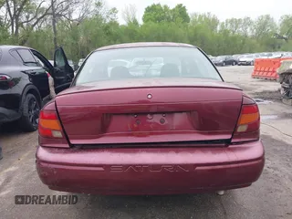 2001 Saturn SL z VIN 1G8ZH528X1Z355295, wystawiony jako IAAI lot #42057484 z przebiegiem 202 555 mil mil oraz . Historia ofert i sprzedaży dostępna na DreamBid. Obrazek 16.