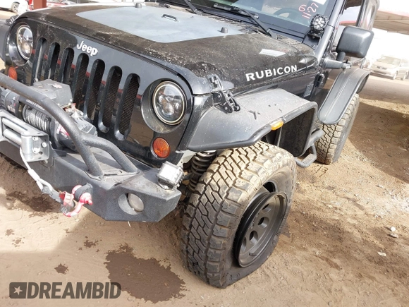 2011 Jeep Wrangler Rubicon with VIN 1J4BA6D13BL545343, listed as a IAAI auction lot 40980056 with 107,207 mi miles and . Bid and sale history available at carsss.com. Image 6.