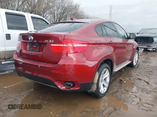 2012 BMW X6 35i z VIN 5UXFG2C54CL779333, wystawiony jako IAAI lot #41914135 z przebiegiem 63 305 mil mil oraz . Historia ofert i sprzedaży dostępna na DreamBid. Obrazek 4.