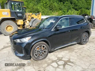 2025 BMW X1 xDrive28i with VIN WBX73EF09S5078103, listed as a Copart auction lot 56821205 with Not provided miles and Salvage title. Bid and sale history available at DreamBid. Image 1.