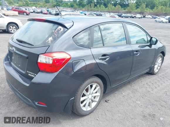 2012 Subaru Impreza Premium with VIN JF1GPAC69CH201245, listed as a IAAI auction lot 42687253 with 169,089 mi miles and . Bid and sale history available at DreamBid. Image 4.