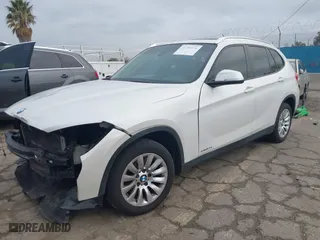 2013 BMW X1 28i with VIN WBAVM1C53DVW45884, listed as a IAAI auction lot 41750396 with 143,287 mi miles. Bid and sale history available at carsss.com. Image 18.