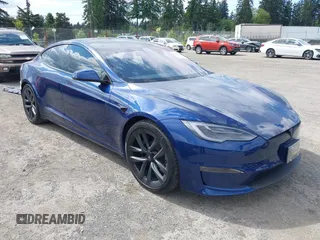 2022 Tesla Model S z VIN 5YJSA1E52NF466702, wystawiony jako IAAI lot #42336192 z przebiegiem 18 128 mil mil oraz . Historia ofert i sprzedaży dostępna na DreamBid. Obrazek 1.