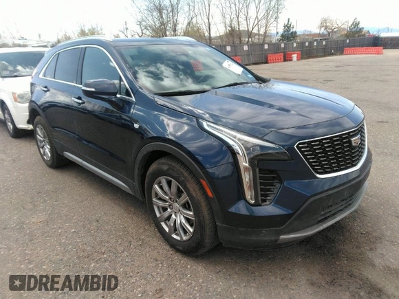 2021 Cadillac XT4 FWD Premium Luxury with VIN 1GYFZCR48MF004009, listed as a IAAI auction lot 41956723 with 82,483 mi miles. Bid and sale history available at carsss.com. Image 1.