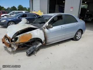 2006 Kia Spectra EX with VIN KNAFE121665348840, listed as a Copart auction lot 69798184 with 0 mi miles and Salvage Title. Bid and sale history available at carsss.com. Image 1.