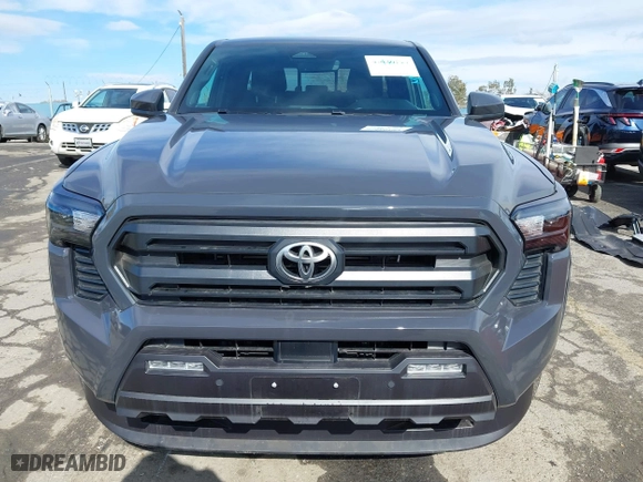 2024 Toyota Tacoma 4WD SR5 with VIN 3TMLB5JN7RM022456, listed as a IAAI auction lot 41430159 with 6,058 mi miles. Bid and sale history available at carsss.com. Image 13.