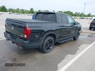 2023 Honda Ridgeline Black Edition with VIN 5FPYK3F86PB015746, listed as a IAAI auction lot 42311862 with 40,181 mi miles and . Bid and sale history available at DreamBid. Image 4.
