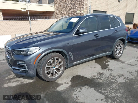 2021 BMW X5 xDrive45e with VIN 5UXTA6C09M9D26035, listed as a IAAI auction lot 41788981 with 60,571 mi miles and . Bid and sale history available at DreamBid. Image 2.