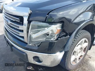 2014 Ford F-150 XL with VIN 1FTFW1CF0EKG40901, listed as a IAAI auction lot 41704498 with 236,317 mi miles and . Bid and sale history available at carsss.com. Image 6.