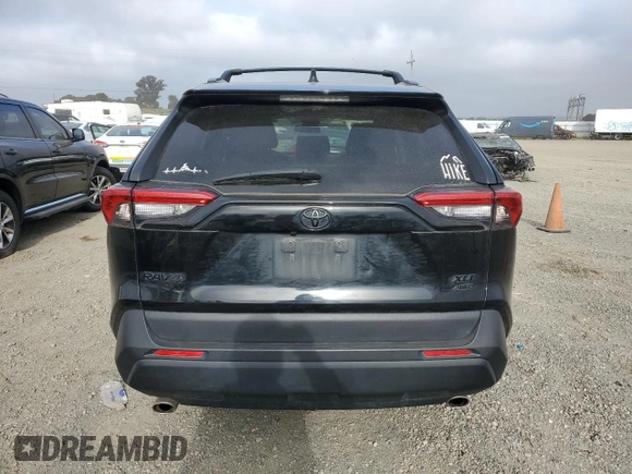 2019 Toyota RAV4 XLE with VIN 2T3P1RFV0KC054000, listed as a Copart auction lot 55255165 with 72,526 mi miles and Salvage title. Bid and sale history available at DreamBid. Image 6.