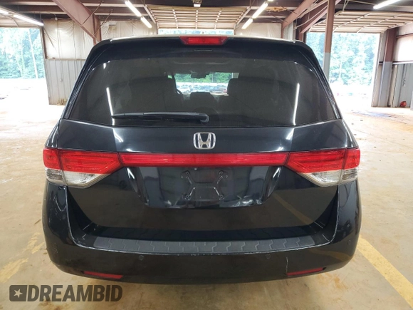 2015 Honda Odyssey Touring Elite with VIN 5FNRL5H99FB005576, listed as a Copart auction lot 58963215 with 167,967 mi miles and Salvage title. Bid and sale history available at DreamBid. Image 6.