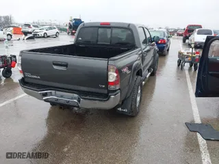 2011 Toyota Tacoma with VIN 3TMLU4ENXBM062437, listed as a IAAI auction lot 41458901 with 182,275 mi miles. Bid and sale history available at carsss.com. Image 4.