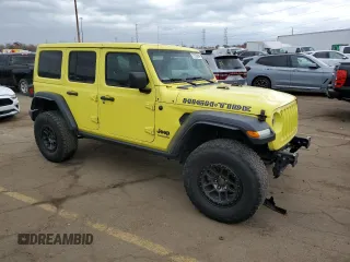 2022 Jeep Wrangler Unlimited High Tide with VIN 1C4HJXDG0NW204141, listed as a Copart auction lot 77570924 with 58,114 mi miles and Salvage Title. Bid and sale history available at DreamBid. Image 4.