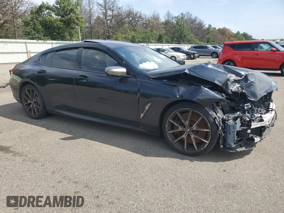 2020 BMW 8 Series M850i with VIN WBAGV8C07LBP48826, listed as a Copart auction lot 65445504 with 32,147 mi miles and Salvage title. Bid and sale history available at DreamBid. Image 4.