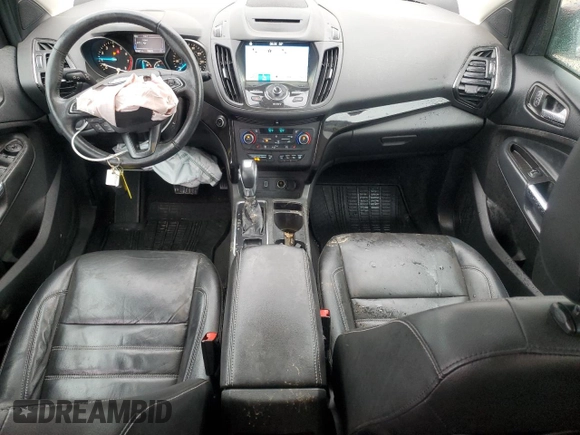 2018 Ford Escape Titanium z VIN 1FMCU0J93JUA70449, wystawiony jako Copart lot #59303245 z przebiegiem 165 907 mil mil oraz Szkoda całkowita • Salvage title. Historia ofert i sprzedaży dostępna na DreamBid. Obrazek 8.