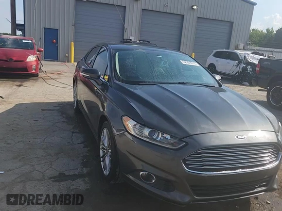 2016 Ford Fusion SE z VIN 3FA6P0HD9GR169611, wystawiony jako Copart lot #62939075 z przebiegiem 170 230 mil mil oraz Szkoda całkowita • Salvage title. Historia ofert i sprzedaży dostępna na DreamBid. Obrazek 13.