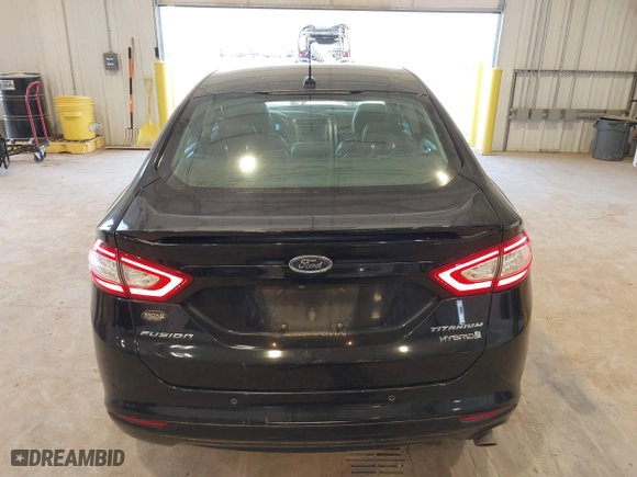 2016 Ford Fusion Titanium Hybrid with VIN 3FA6P0RU7GR127307, listed as a IAAI auction lot 41944427 with 128,076 mi miles. Bid and sale history available at carsss.com. Image 17.