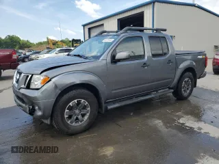 2018 Nissan Frontier Pro-4X with VIN 1N6AD0EV0JN751825, listed as a Copart auction lot 62070445 with 174,574 mi miles and Salvage title. Bid and sale history available at DreamBid. Image 1.