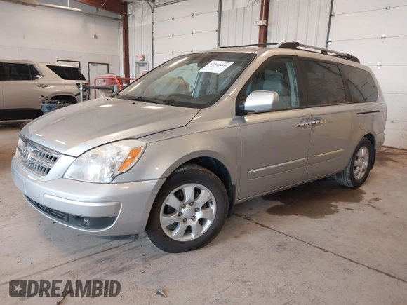 2007 Hyundai Entourage GLS with VIN KNDMC233576018334, listed as a IAAI auction lot 42302468 with 183,557 mi miles and . Bid and sale history available at DreamBid. Image 2.