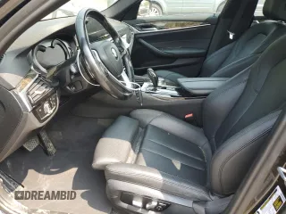 2018 BMW 5 Series 530e xDrive z VIN WBAJB1C52JG623900, wystawiony jako Copart lot #58125105 z przebiegiem 101 615 mil mil oraz Szkoda całkowita • Salvage title. Historia ofert i sprzedaży dostępna na DreamBid. Obrazek 7.