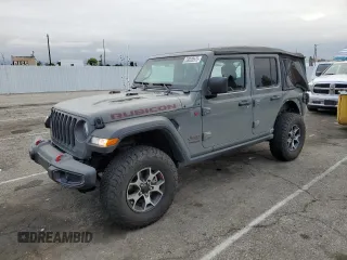 2022 Jeep Wrangler Unlimited Rubicon with VIN 1C4HJXFGXNW158038, listed as a Copart auction lot 53020575 with 14,355 mi miles and Salvage title. Bid and sale history available at DreamBid. Image 1.
