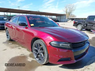 2020 Dodge Charger SXT with VIN 2C3CDXBG3LH104815, listed as a IAAI auction lot 41328084 with 130,322 mi miles and . Bid and sale history available at DreamBid. Image 1.