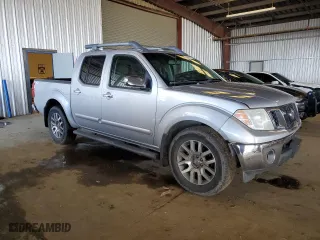 2009 Nissan Frontier SE with VIN 1N6AD07U69C403815, listed as a Copart auction lot 49161015 with 181,843 mi miles and Salvage Title. Bid and sale history available at carsss.com. Image 4.
