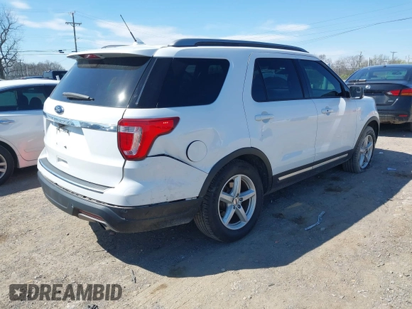 2018 Ford Explorer XLT z VIN 1FM5K7D85JGC71116, wystawiony jako IAAI lot #41901774 z przebiegiem 68 957 mil mil oraz . Historia ofert i sprzedaży dostępna na DreamBid. Obrazek 4.