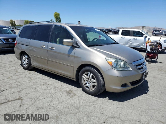 2005 Honda Odyssey EX-L with VIN 5FNRL38625B045152, listed as a Copart auction lot 57633005 with 145,776 mi miles and Salvage title. Bid and sale history available at DreamBid. Image 4.