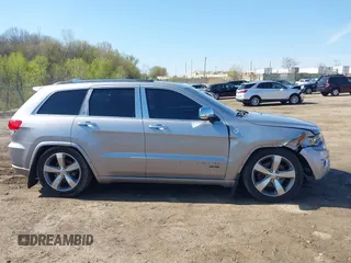 2014 Jeep Grand Cherokee Overland with VIN 1C4RJFCT9EC231840, listed as a IAAI auction lot 42114284 with 170,691 mi miles and . Bid and sale history available at DreamBid. Image 13.