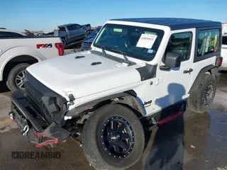 2021 Jeep Wrangler Sport S with VIN 1C4GJXAN2MW663880, listed as a IAAI auction lot 41059915 with 83,867 mi miles and . Bid and sale history available at DreamBid. Image 17.
