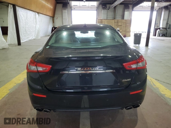 2015 Maserati Ghibli z VIN ZAM57XSA9F1139087, wystawiony jako Copart lot #52235355 z przebiegiem 68 788 mil mil oraz Szkoda całkowita • Salvage title. Historia ofert i sprzedaży dostępna na DreamBid. Obrazek 6.