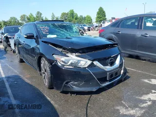 2016 Nissan Maxima SR z VIN 1N4AA6AP4GC403168, wystawiony jako IAAI lot #42475679 z przebiegiem 154 570 mil mil oraz . Historia ofert i sprzedaży dostępna na DreamBid. Obrazek 1.
