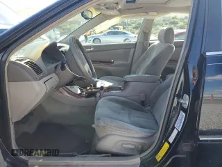 2002 Toyota Camry XLE z VIN 4T1BF30K12U020467, wystawiony jako Copart lot #54628995 z przebiegiem 222 898 mil mil oraz Szkoda całkowita • Salvage title. Historia ofert i sprzedaży dostępna na DreamBid. Obrazek 7.